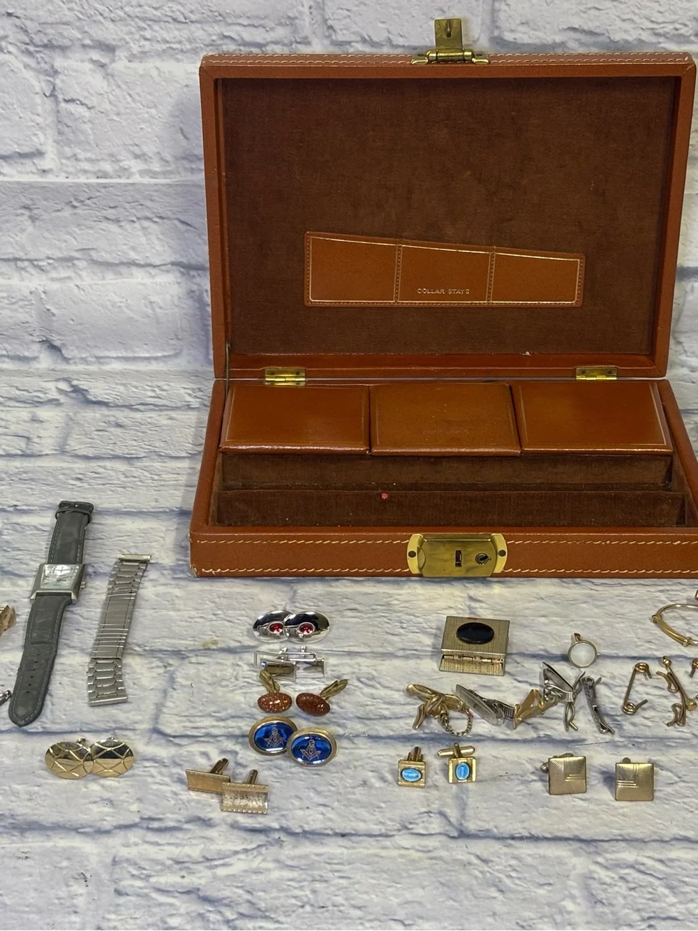 Mid century jewelry box with all the jewelry seen in pictures. Cuff links, tie